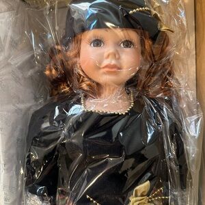 Elegant Black and Gold Doll